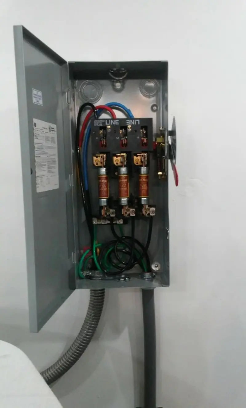 Three-phase disconnect switch installed for Smoke Detector Installation in Cannon Falls